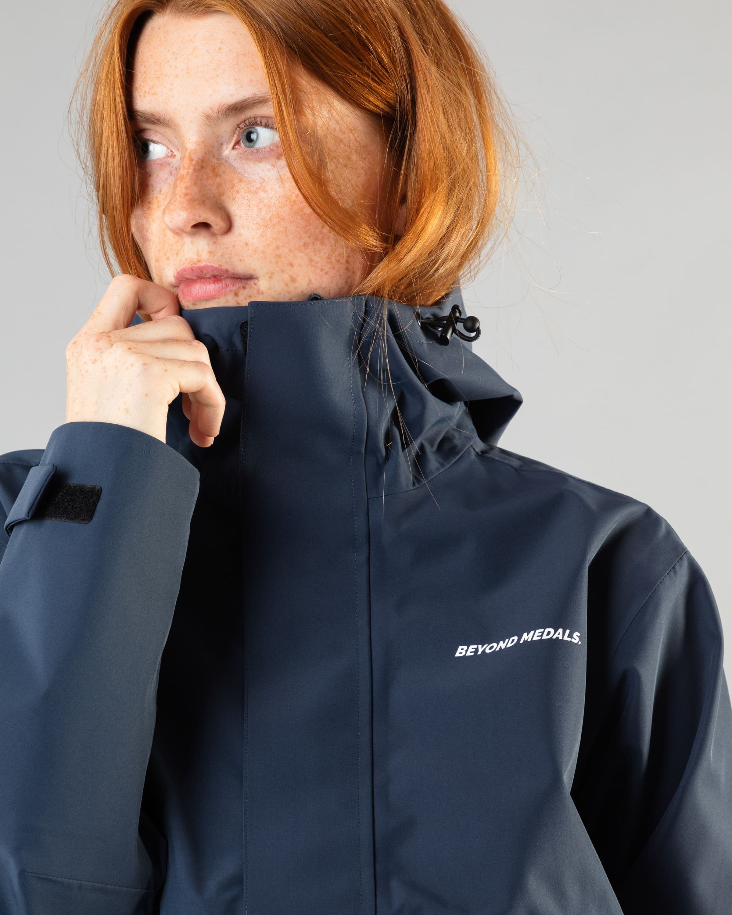 Outerwear clothing, the jacket in blue worn by model, Beyond Medals, 2024, detail1