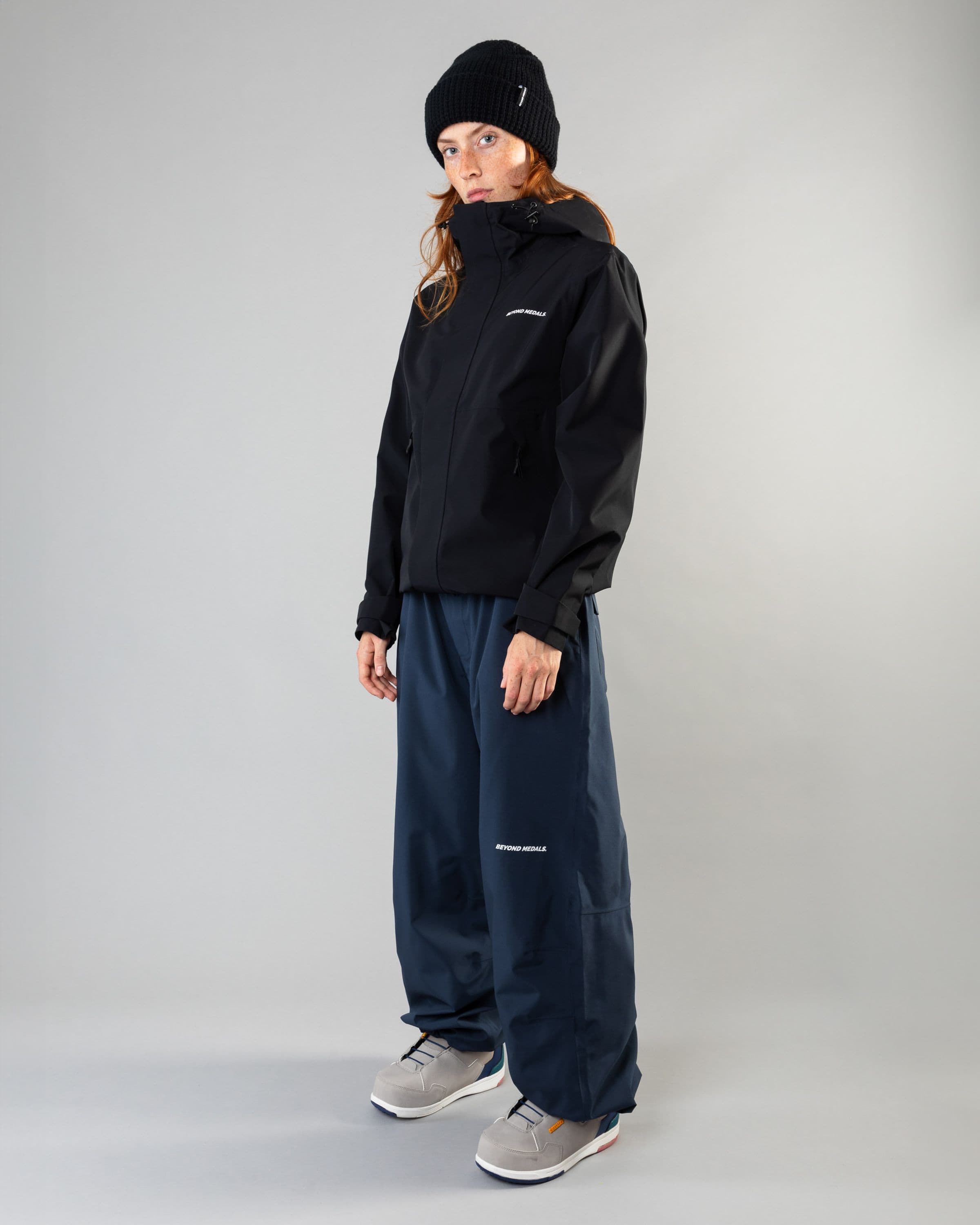 Outerwear clothing, the jacket in black worn by model, Beyond Medals, 2024, full front outer