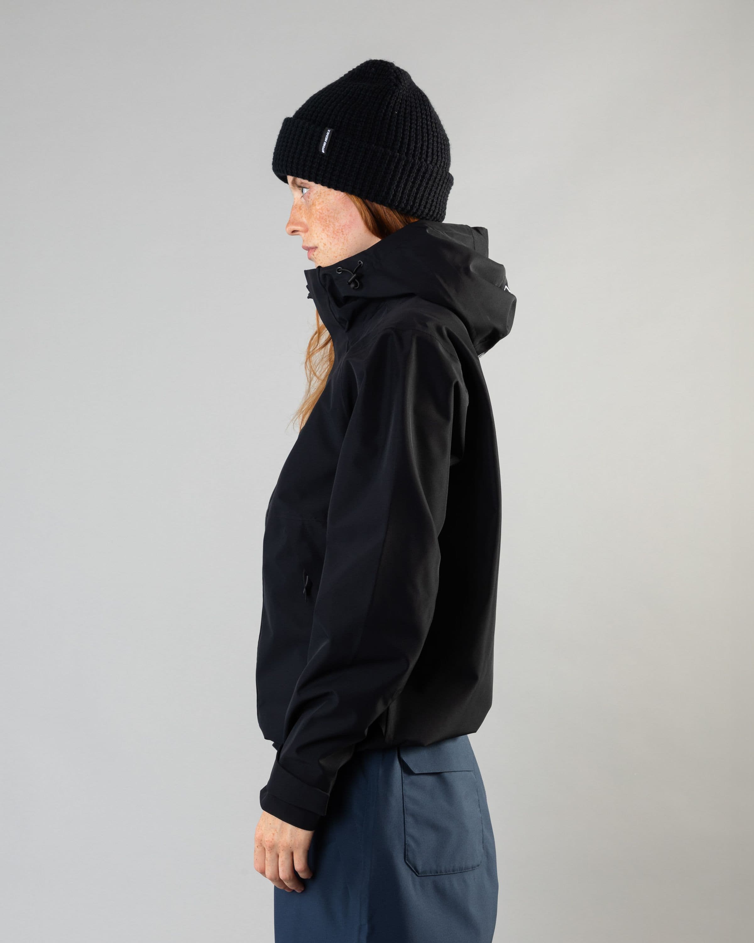 Outerwear clothing, the jacket in black worn by model, Beyond Medals, 2024,side1