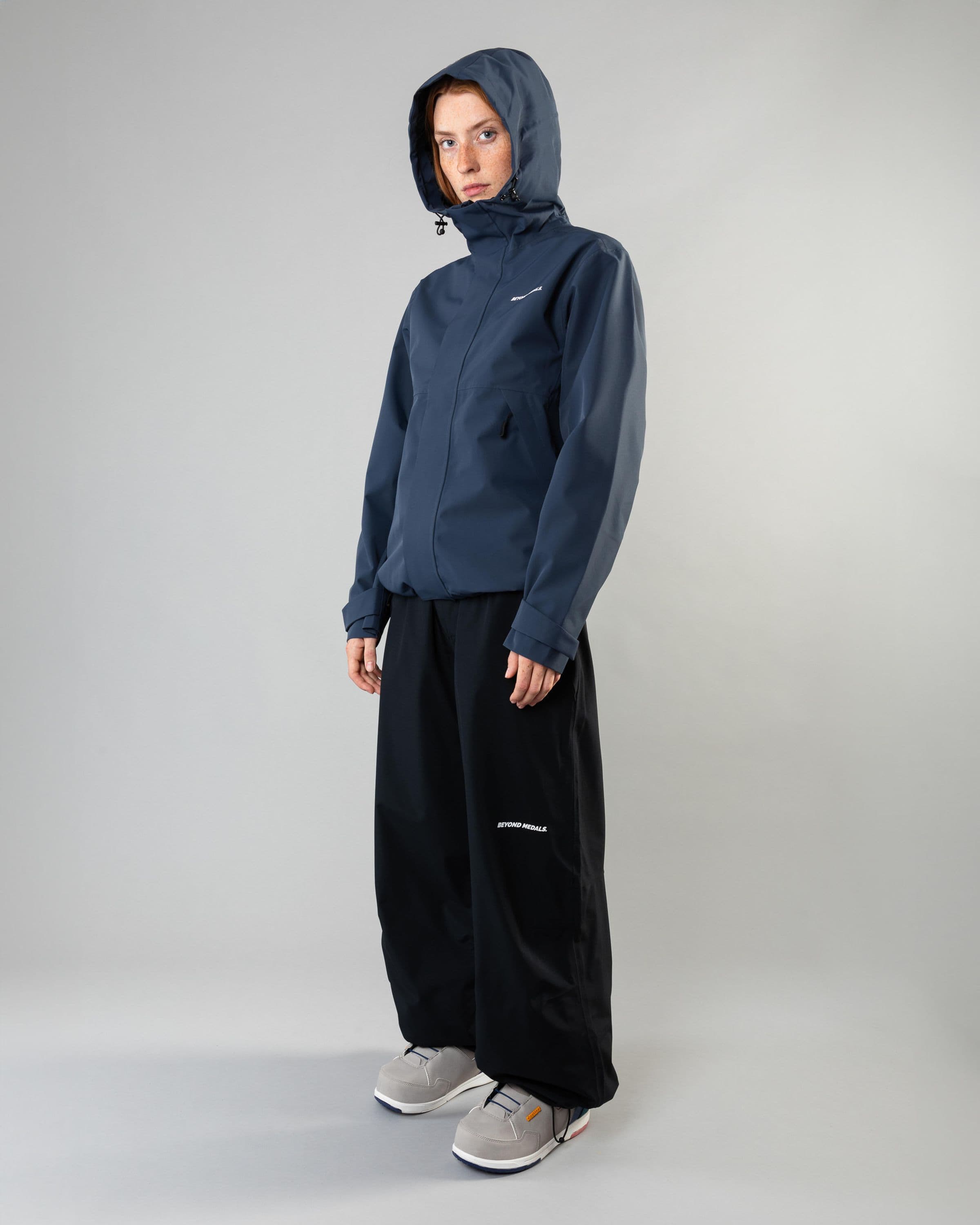 Outerwear clothing, the jacket in blue worn by model, Beyond Medals, 2024, full front outer