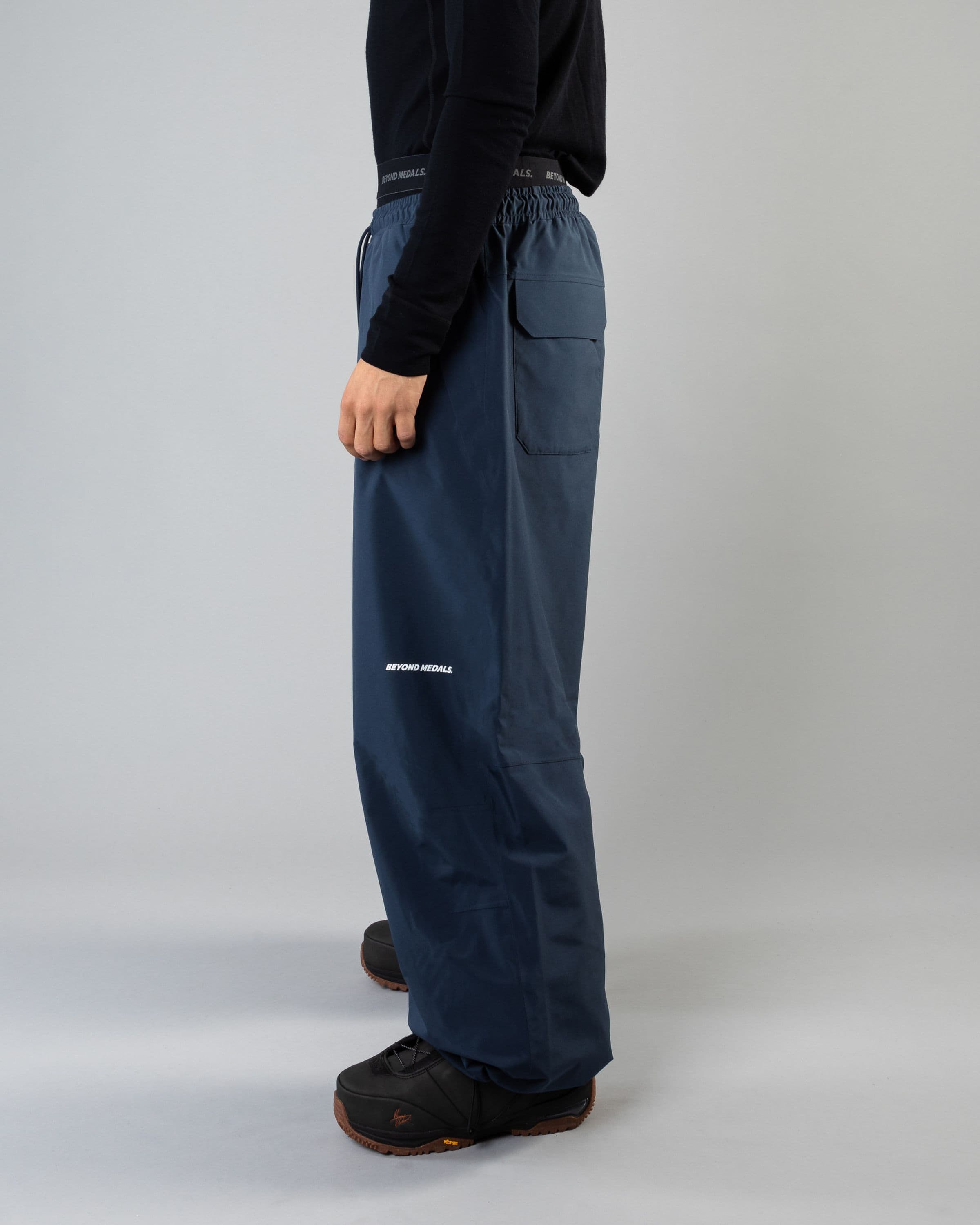 Outerwear clothing, park pants in blue worn by LUDVIG BILLTOFT, Beyond Medals, 2024, side