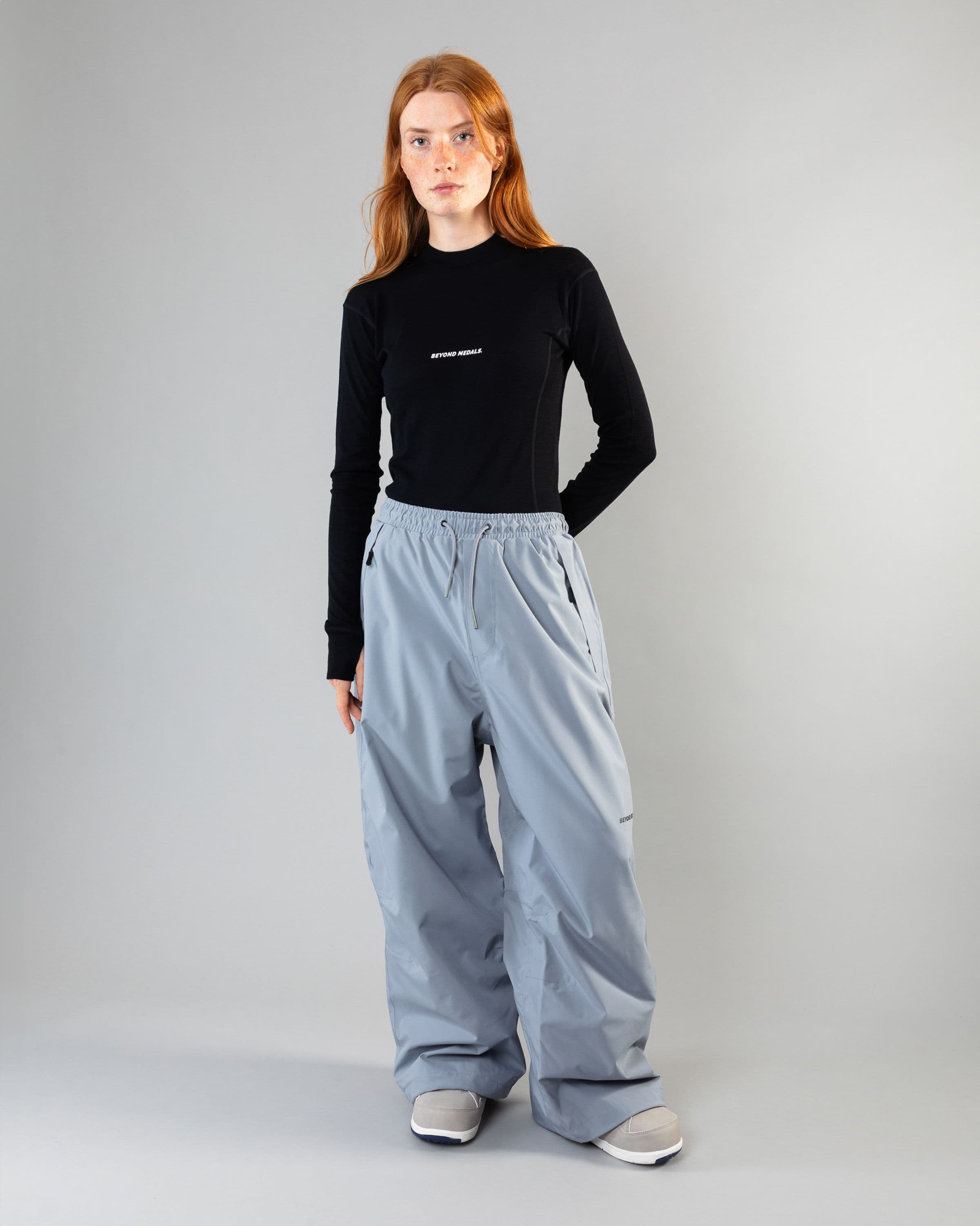 Outerwear clothing, park pants in pale blue worn by model, Beyond Medals, 2024, full front