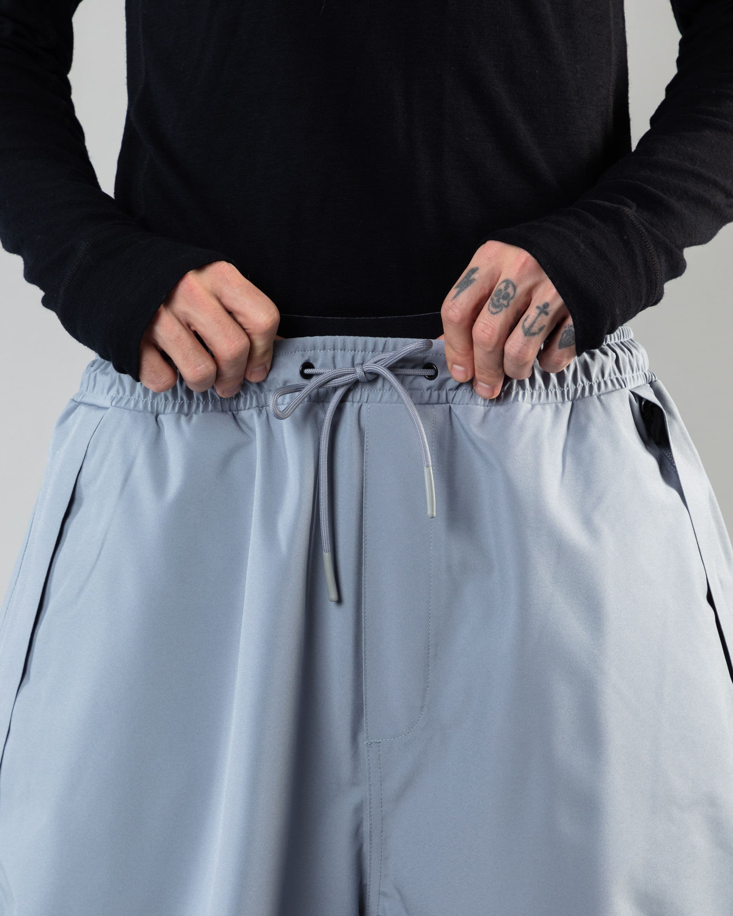 Outerwear clothing, park pants in pale blue worn by KEVIN BÄCKSTRÖM, Beyond Medals, 2024, detail1