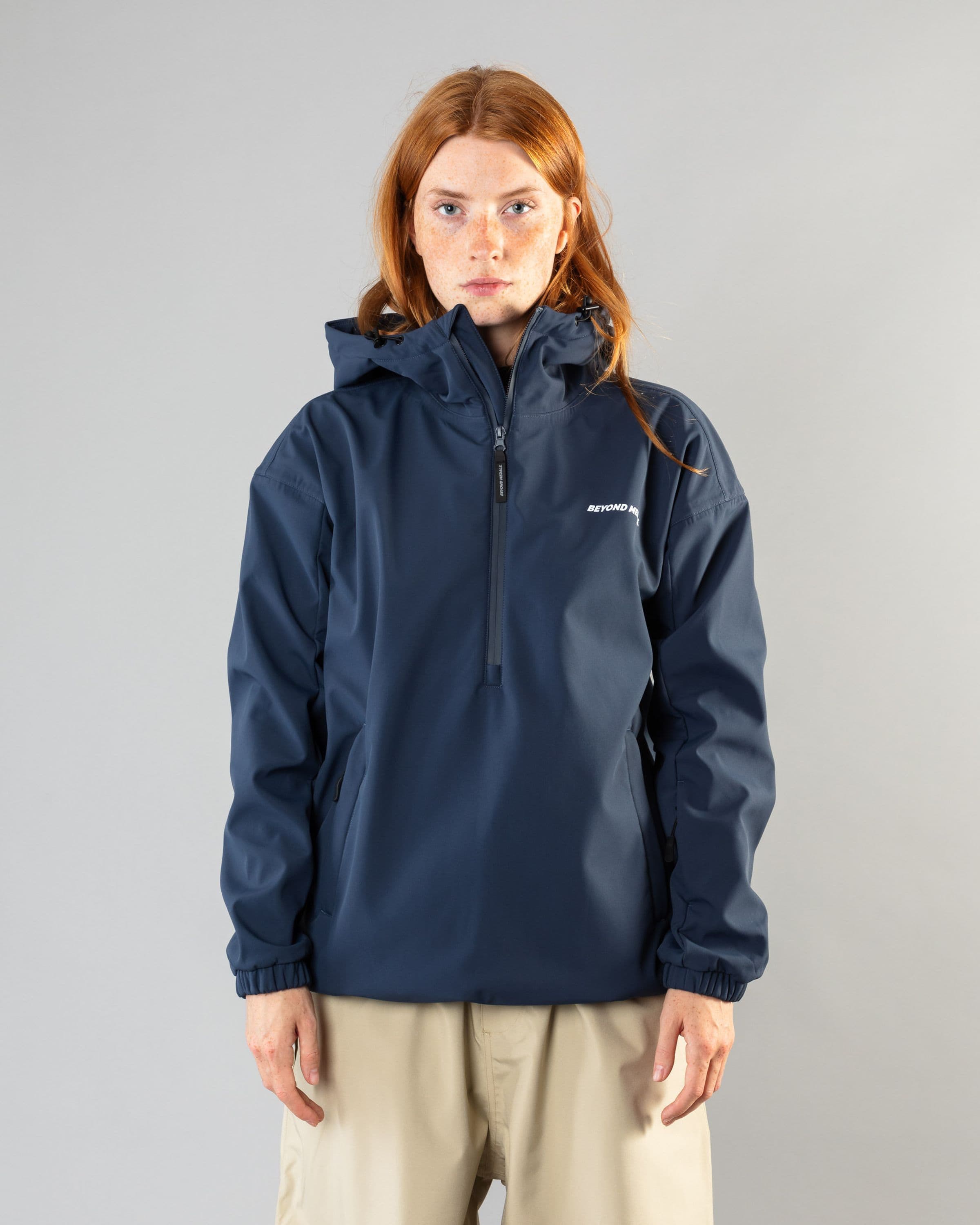 Outerwear clothing, softshell halfzip in blue worn by model, Beyond Medals, 2024, front
