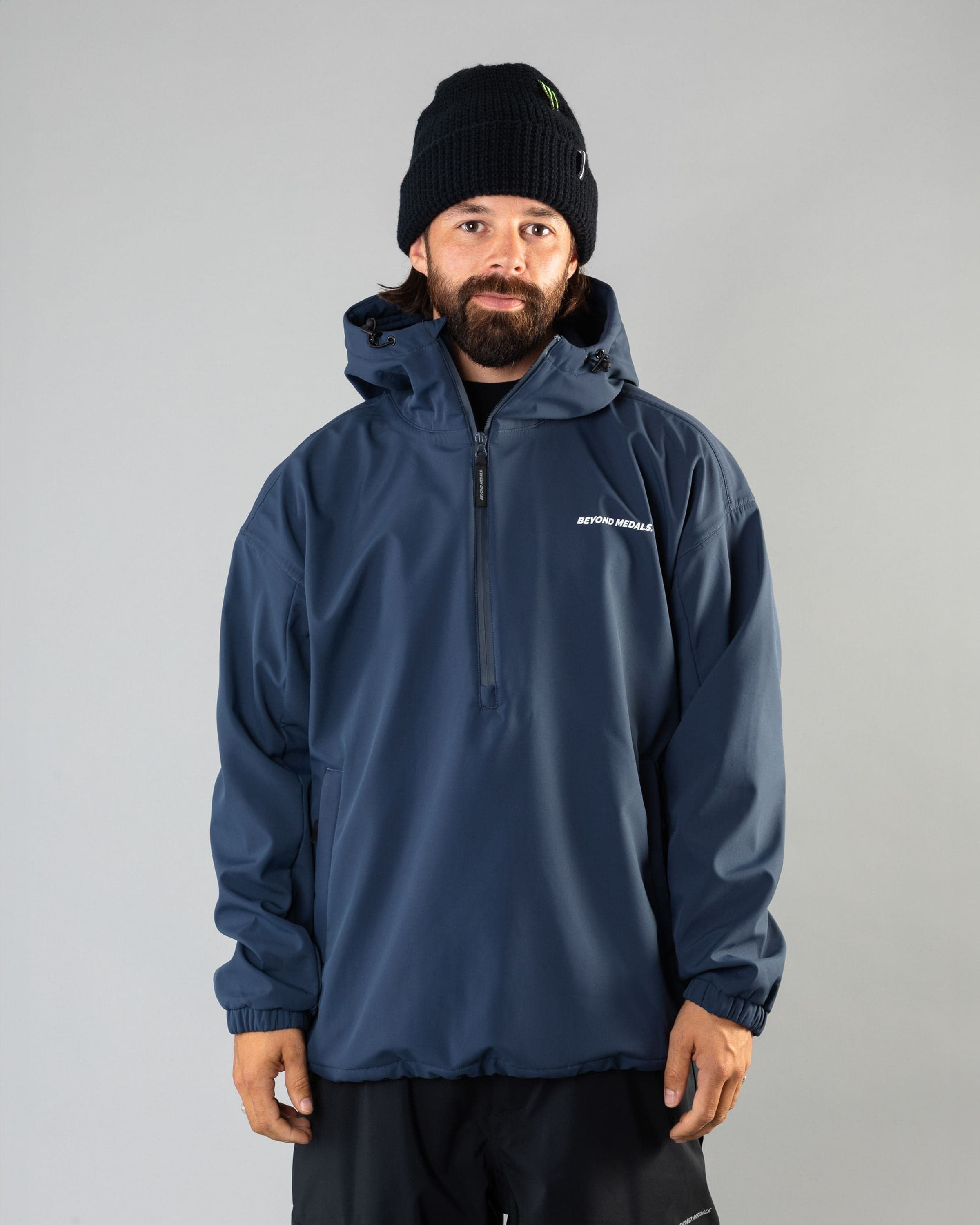 Outerwear clothing, softshell halfzip in blue worn by ULRIK BADERTSCHER, Beyond Medals, 2024, front