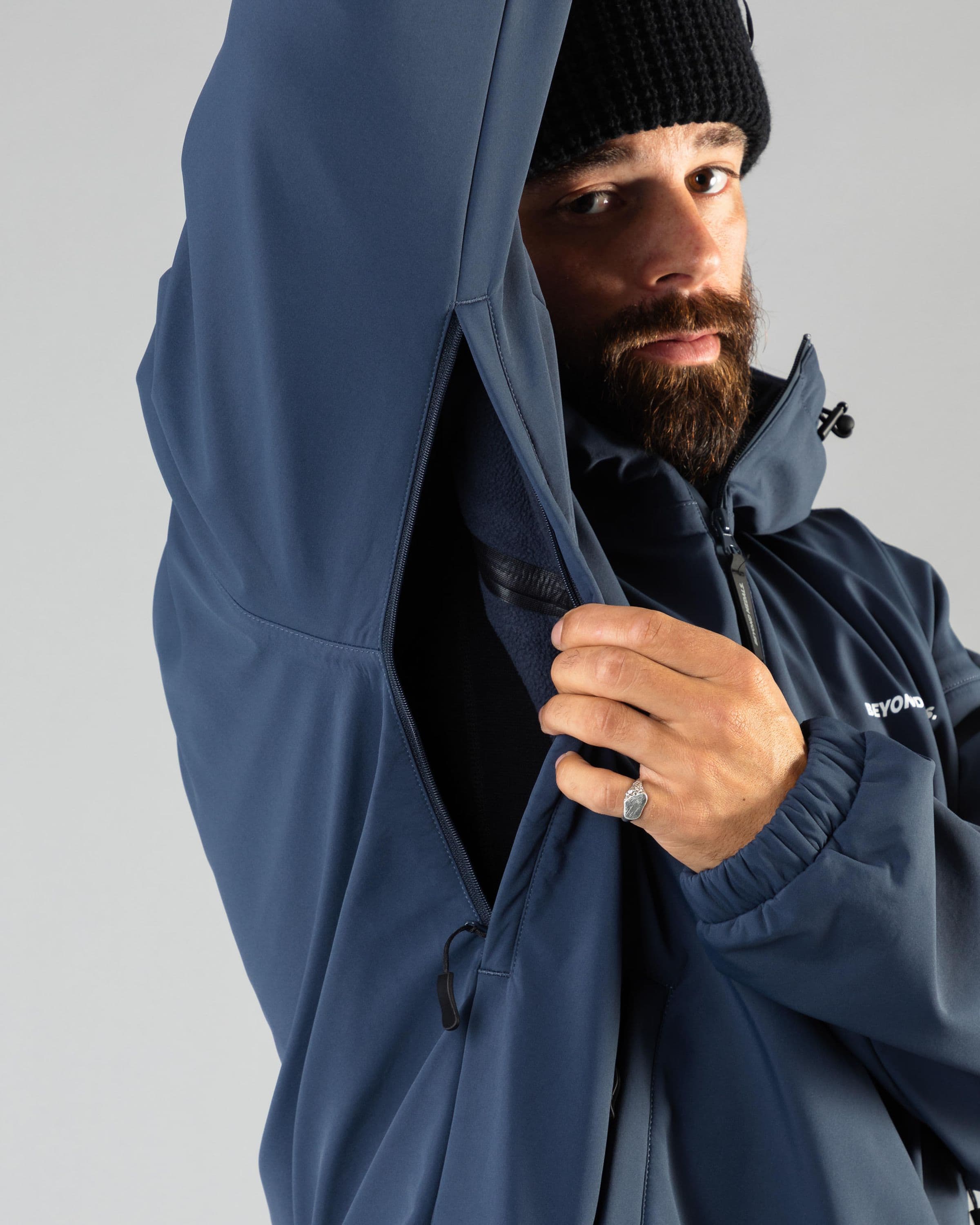 Outerwear clothing, softshell halfzip in blue worn by ULRIK BADERTSCHER, Beyond Medals, 2024, detail1