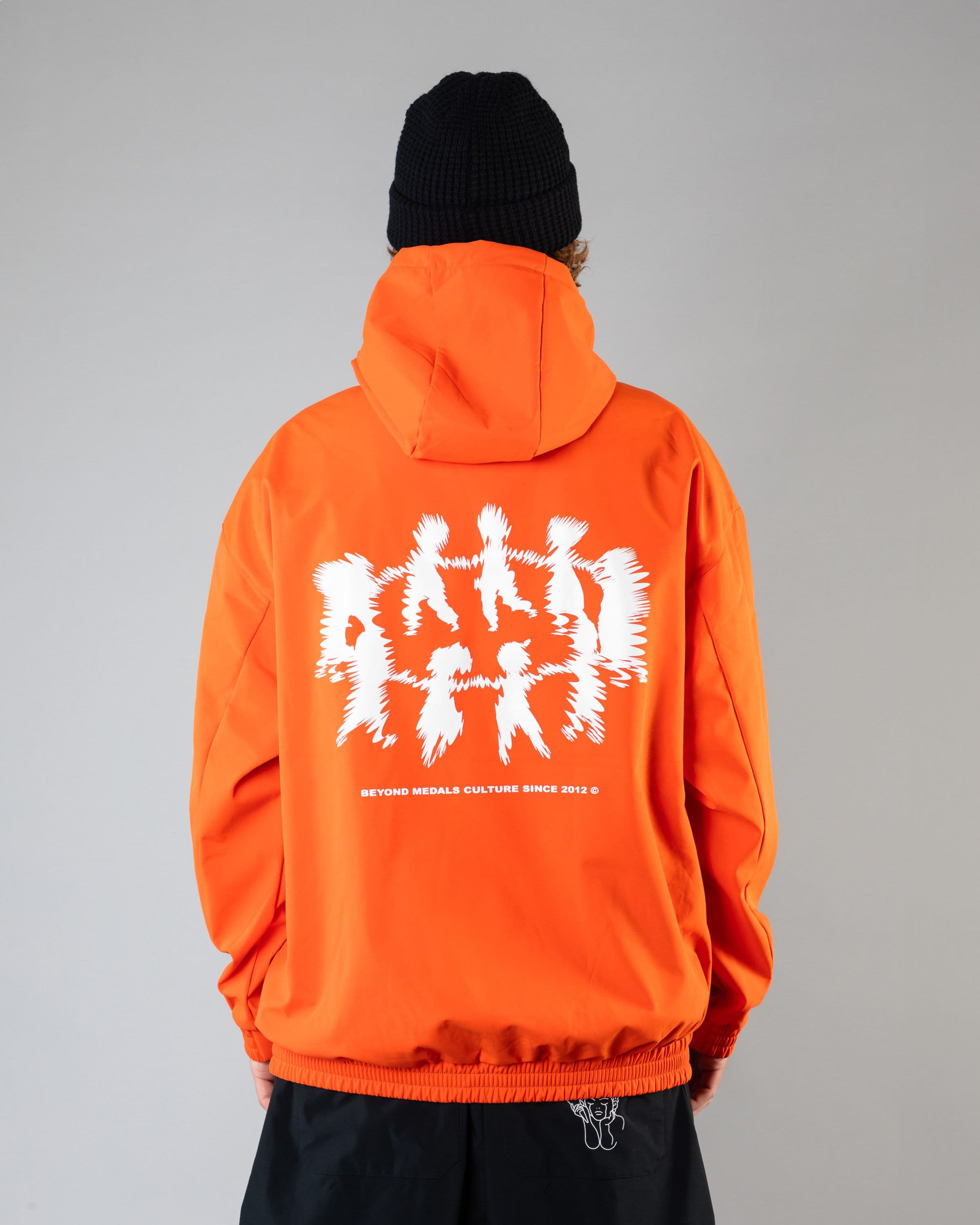 Outerwear clothing, softshell hoodie in orange worn by SEBBE DE BUCK, Beyond Medals, 2024, back