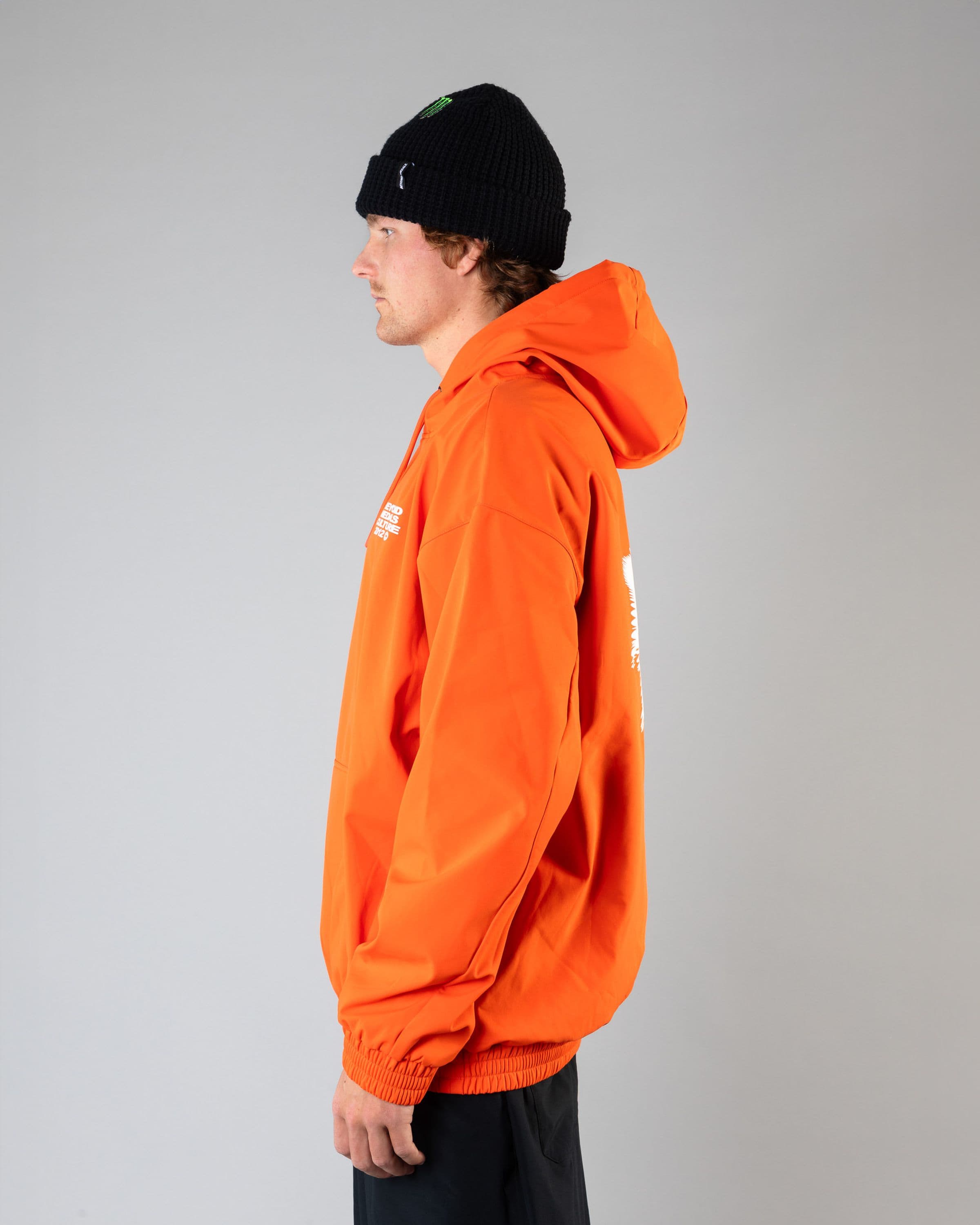 Outerwear clothing, softshell hoodie in orange worn by SEBBE DE BUCK, Beyond Medals, 2024, side