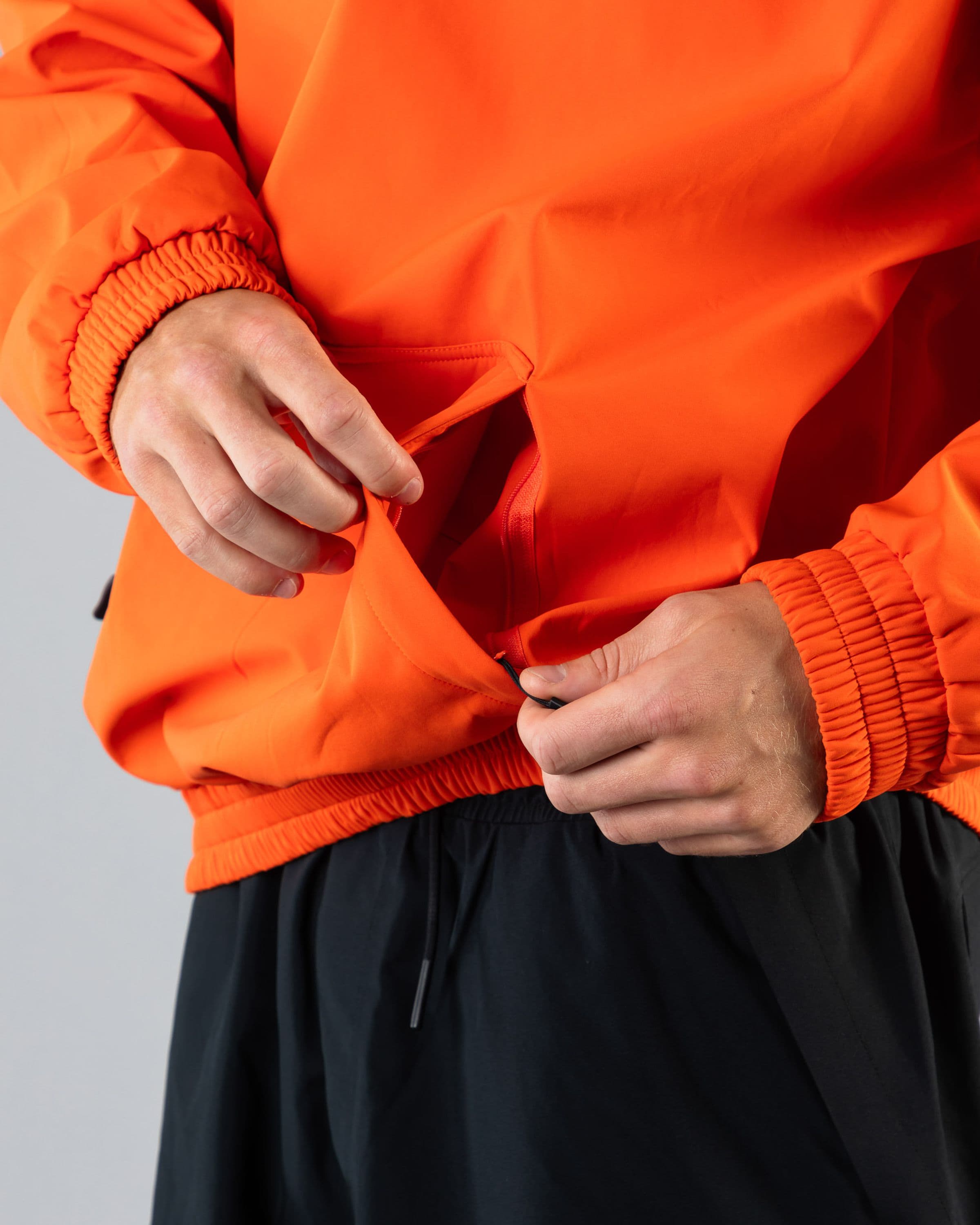 Outerwear clothing, softshell hoodie in orange worn by SEBBE DE BUCK, Beyond Medals, 2024, detail2