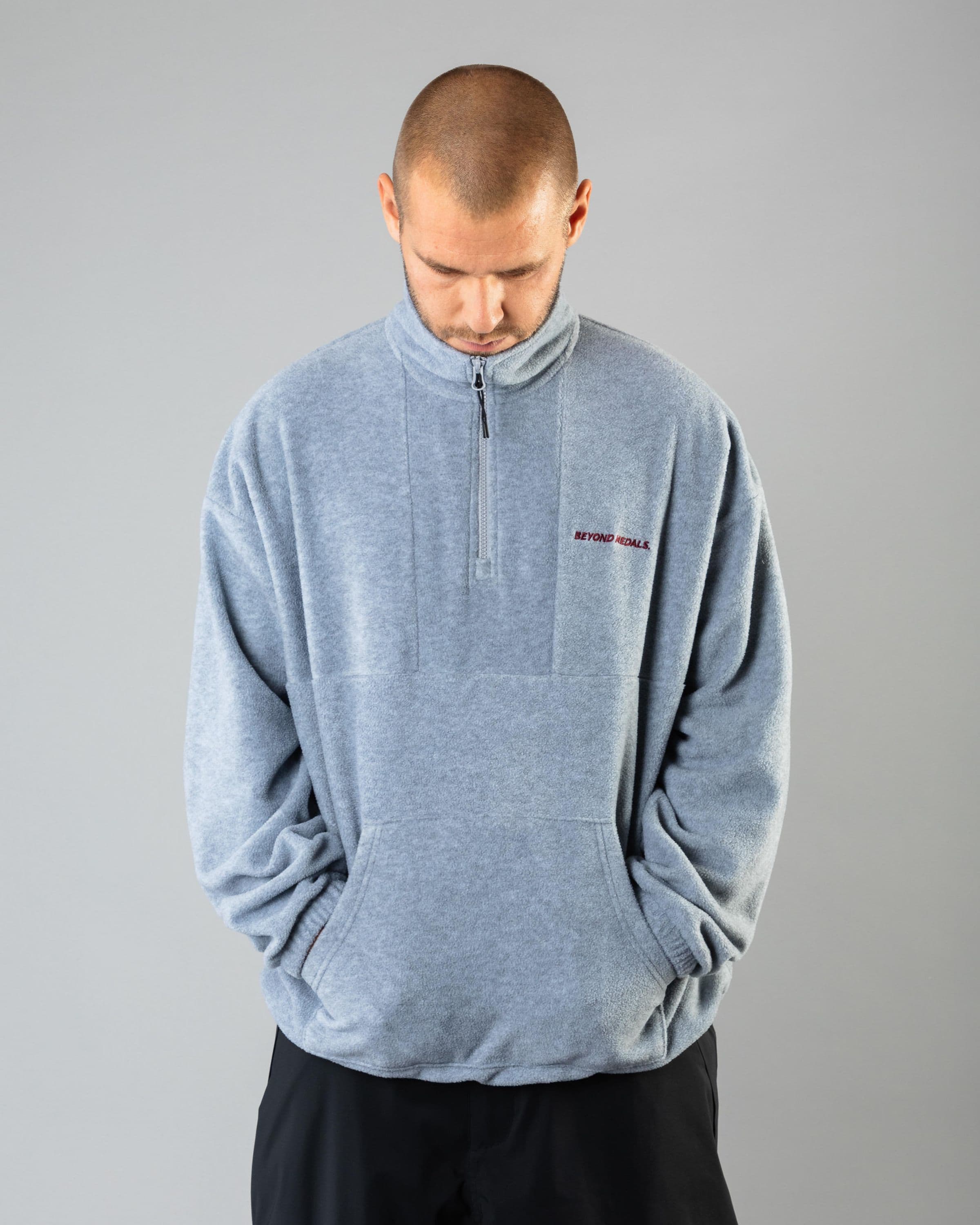 Streetwear clothing, halfzip fleece in grey worn by TOR LUNDSTRÖM, Beyond Medals, 2024, front