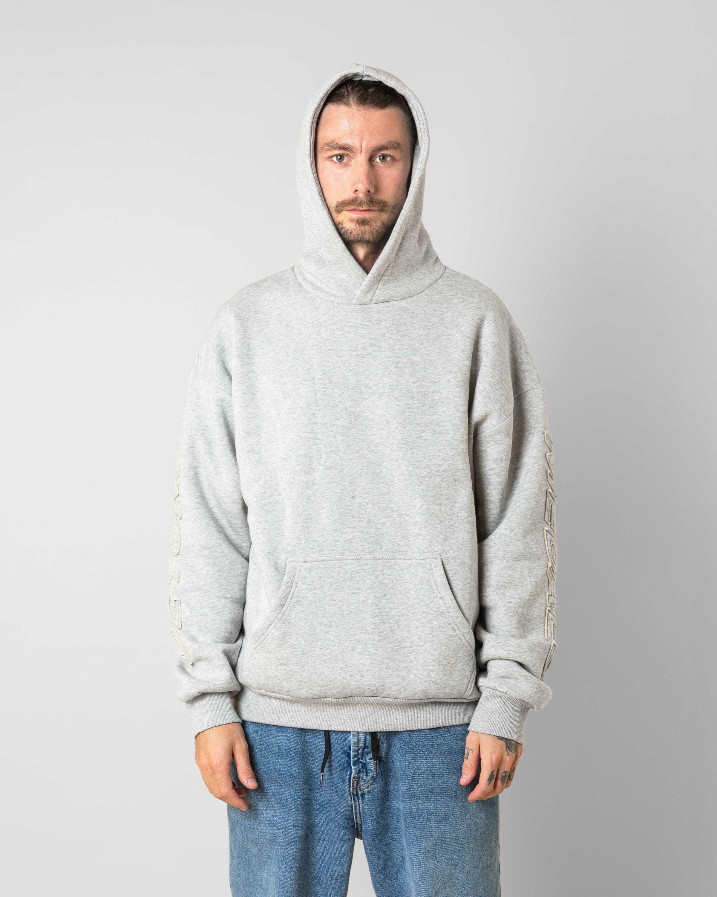 Streetwear clothing, incognito hoodie in grey worn by KEVIN BÄCKSTRÖM, Beyond Medals, 2024, front