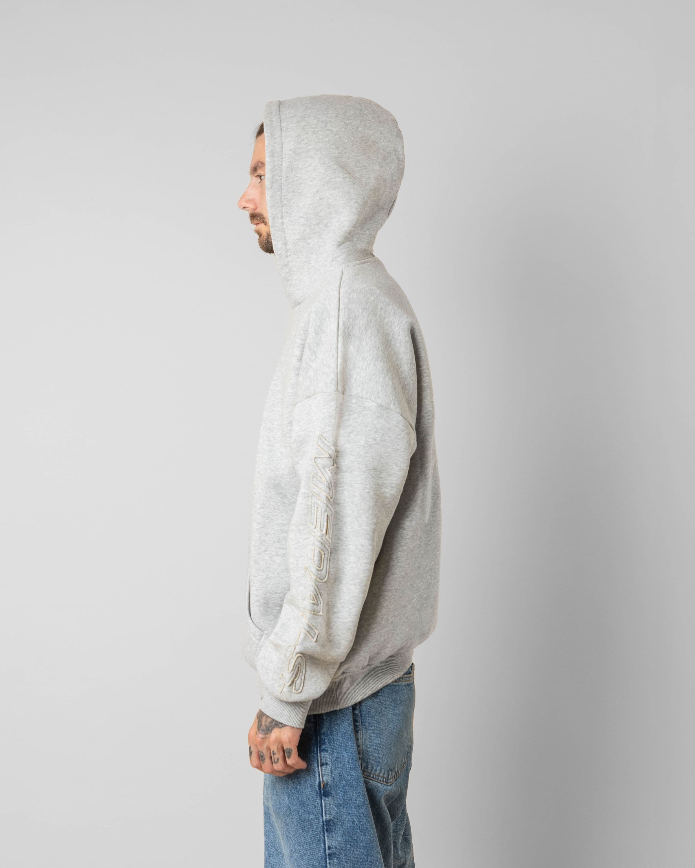 Streetwear clothing, incognito hoodie in grey worn by KEVIN BÄCKSTRÖM, Beyond Medals, 2024, side