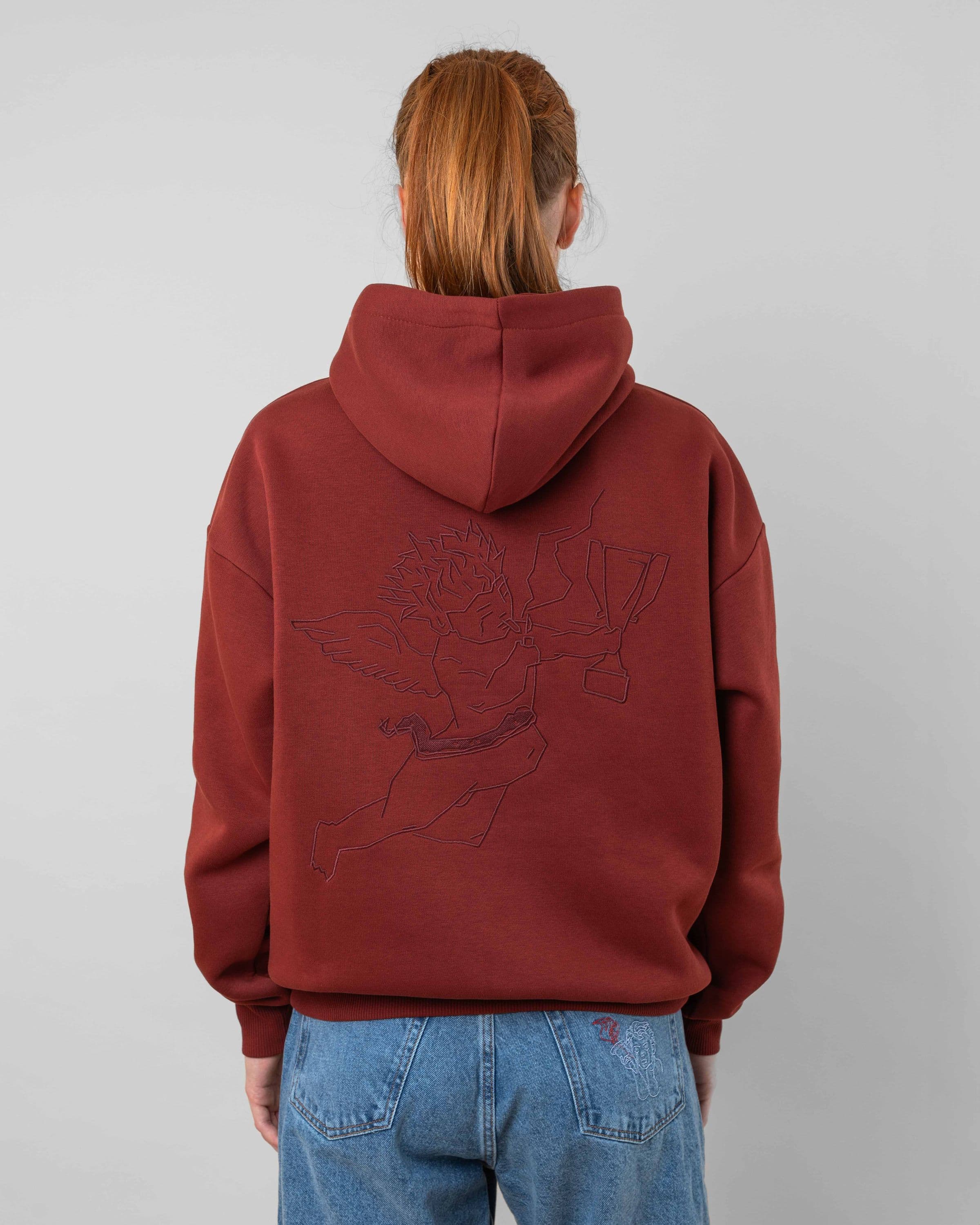 Streetwear clothing, angel hoodie 2.0 in red worn by model, Beyond Medals, 2024, back
