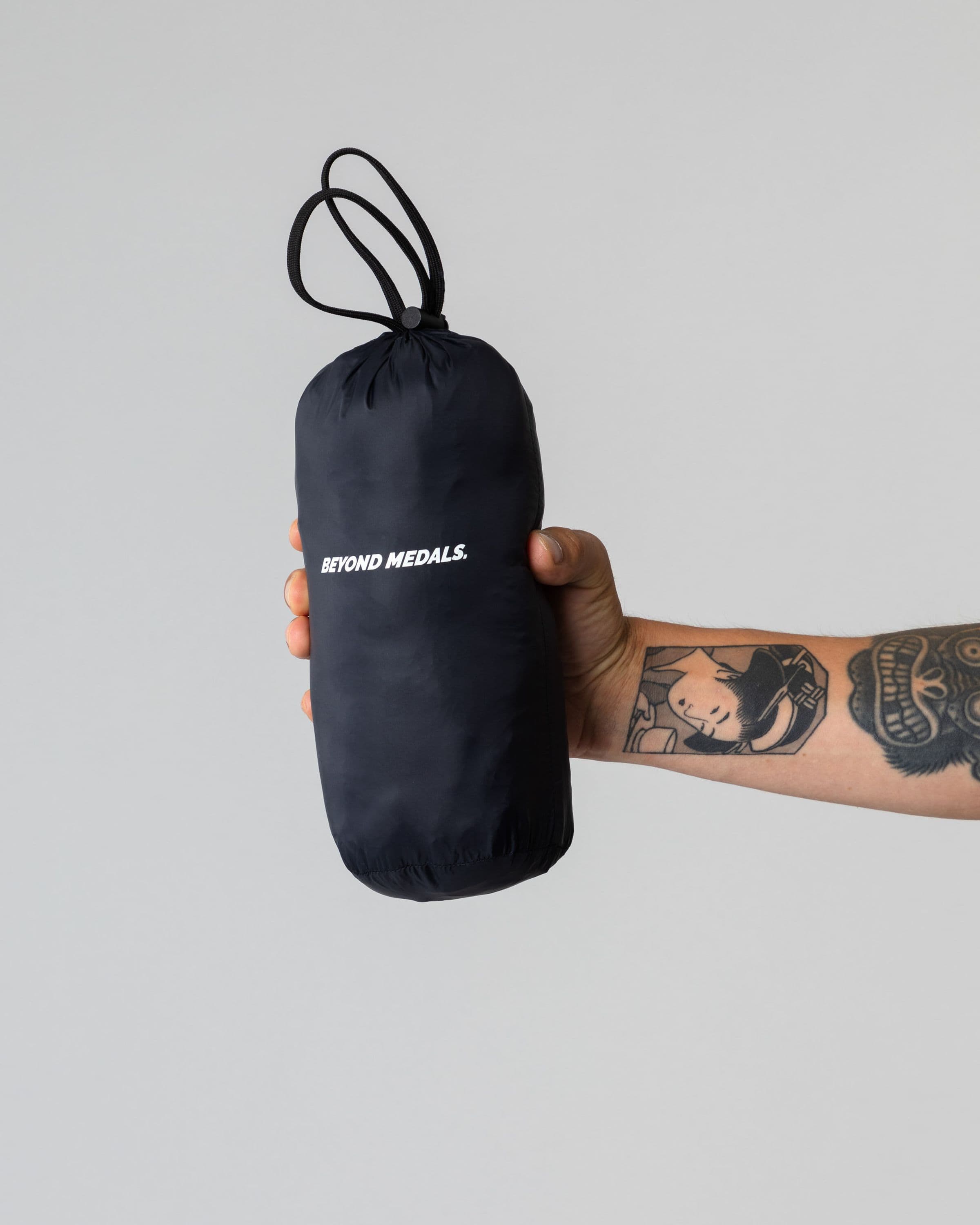 Outerwear clothing, packable down vest in black worn by TOR LUNDSTRÖM, Beyond Medals, 2024, detail2