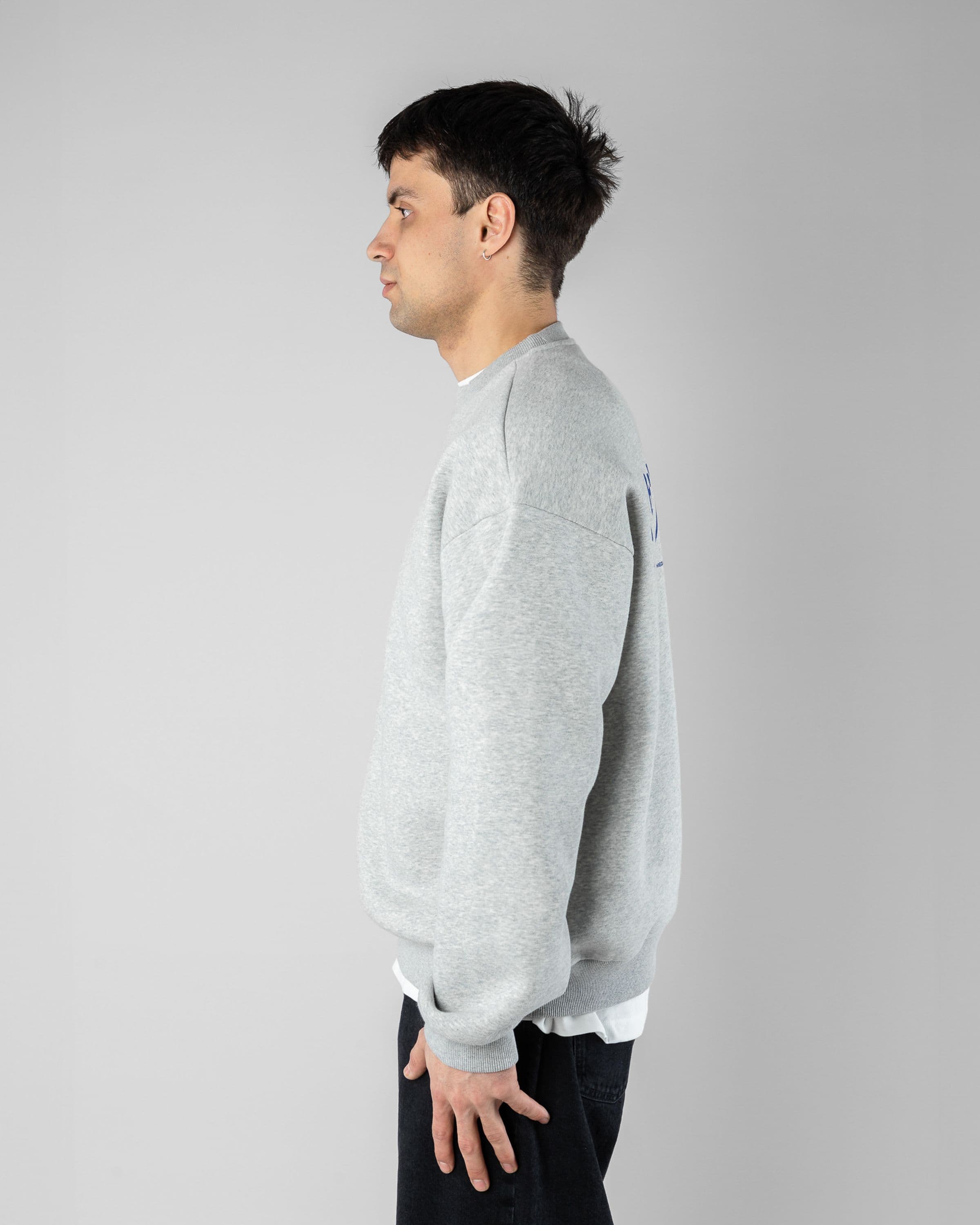 Hokkaido Crewneck Beyond Medals Snowboard & Streetwear Model image side with Magnus as model