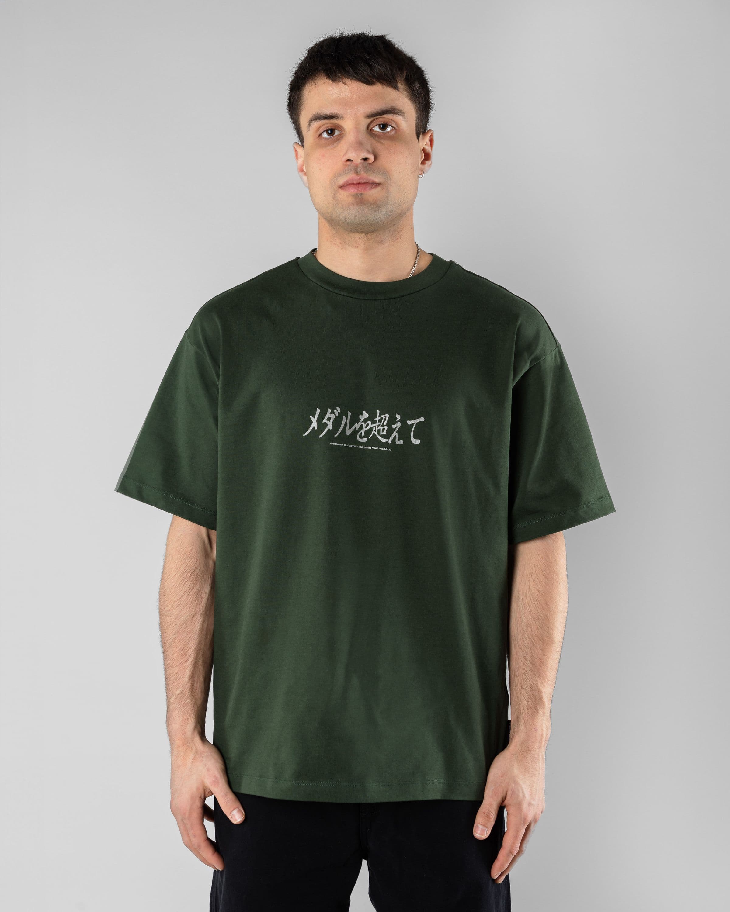 Hokkaido Tee Beyond Medals Snowboard & Streetwear Model image front with Magnus as model