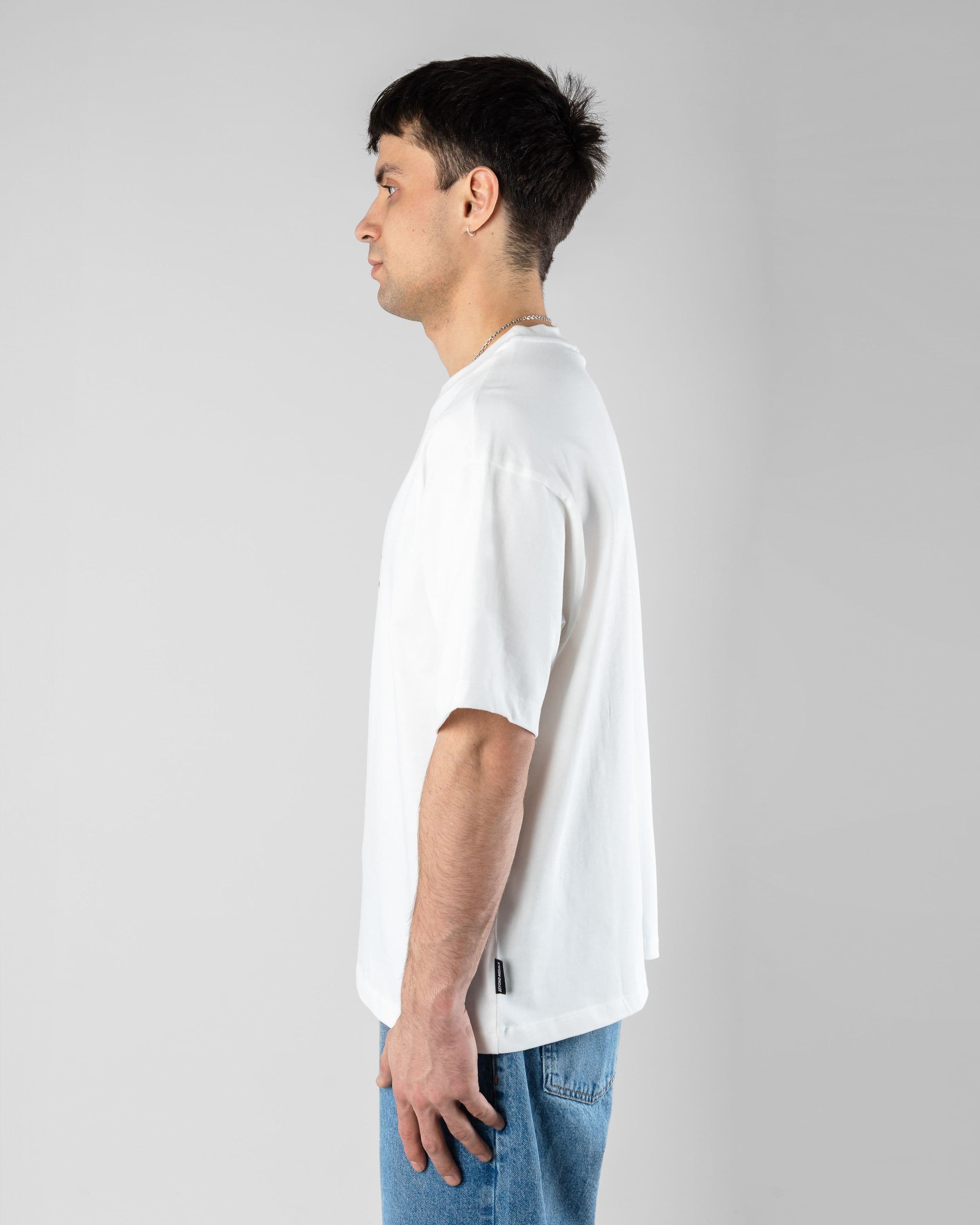 Hokkaido Tee Beyond Medals Snowboard & Streetwear Model image side with Magnus as model