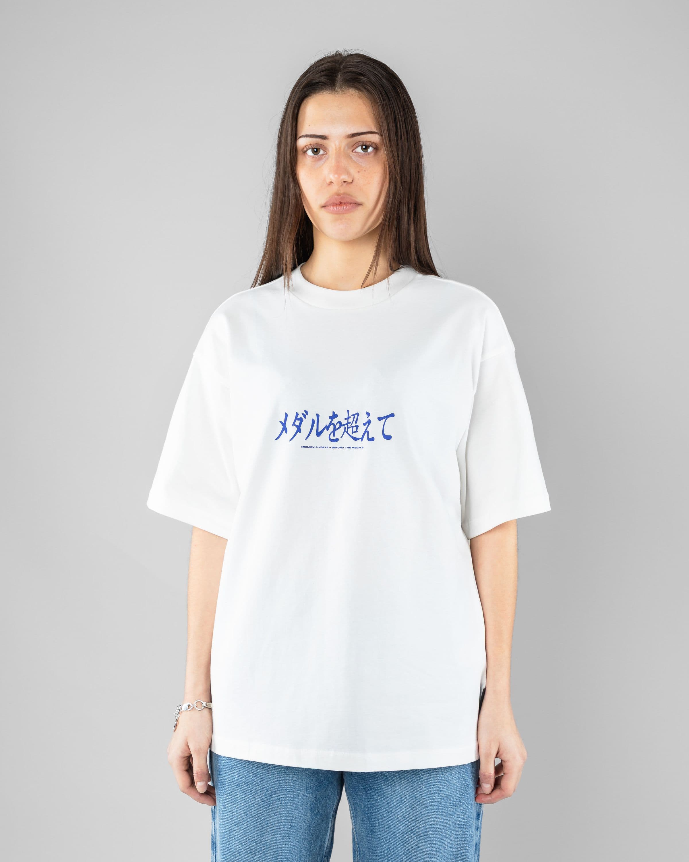 Hokkaido Tee Beyond Medals Snowboard & Streetwear Model image front with Saga as model