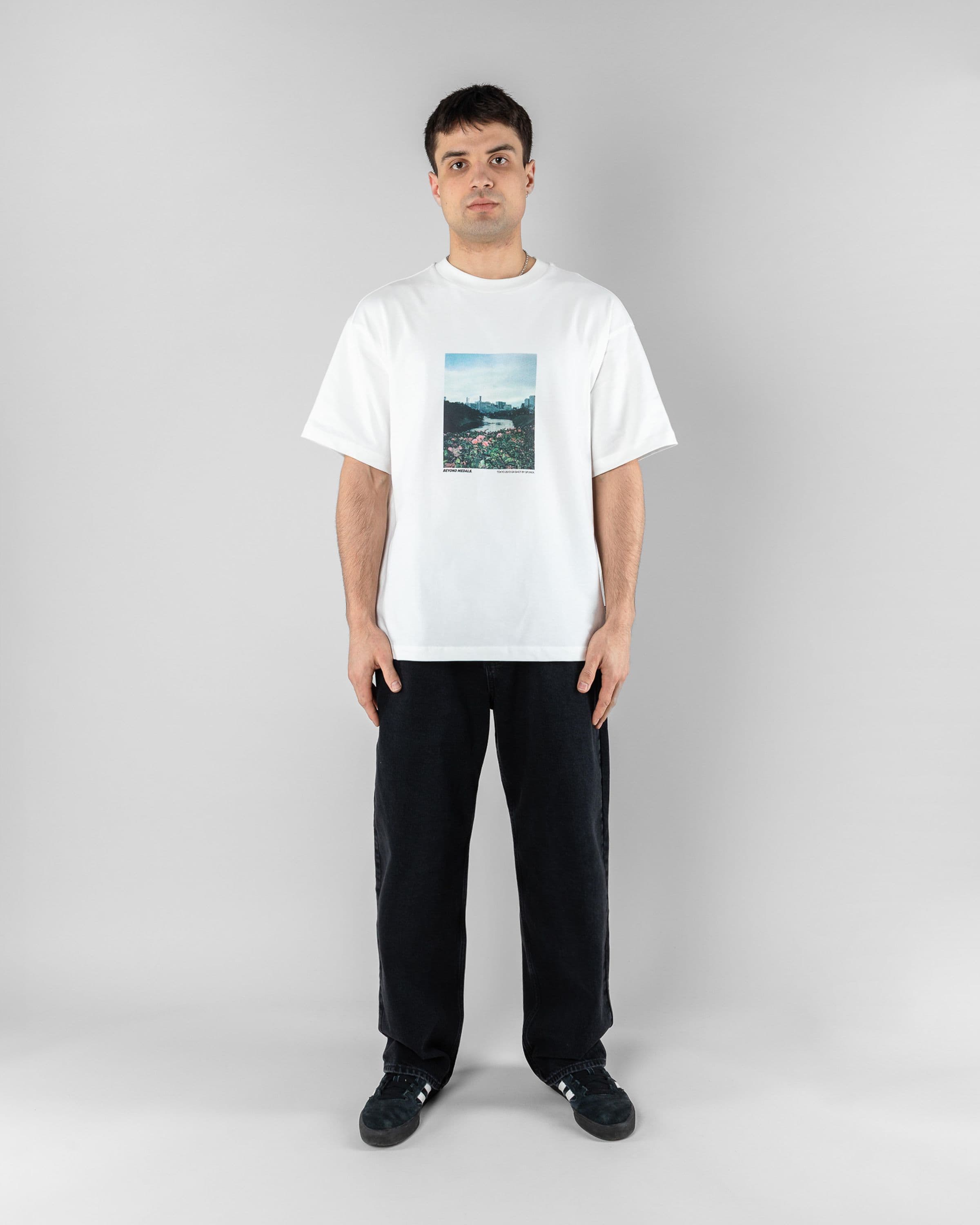 Tokyo Tee Beyond Medals Snowboard & Streetwear Model image front with Magnus as model