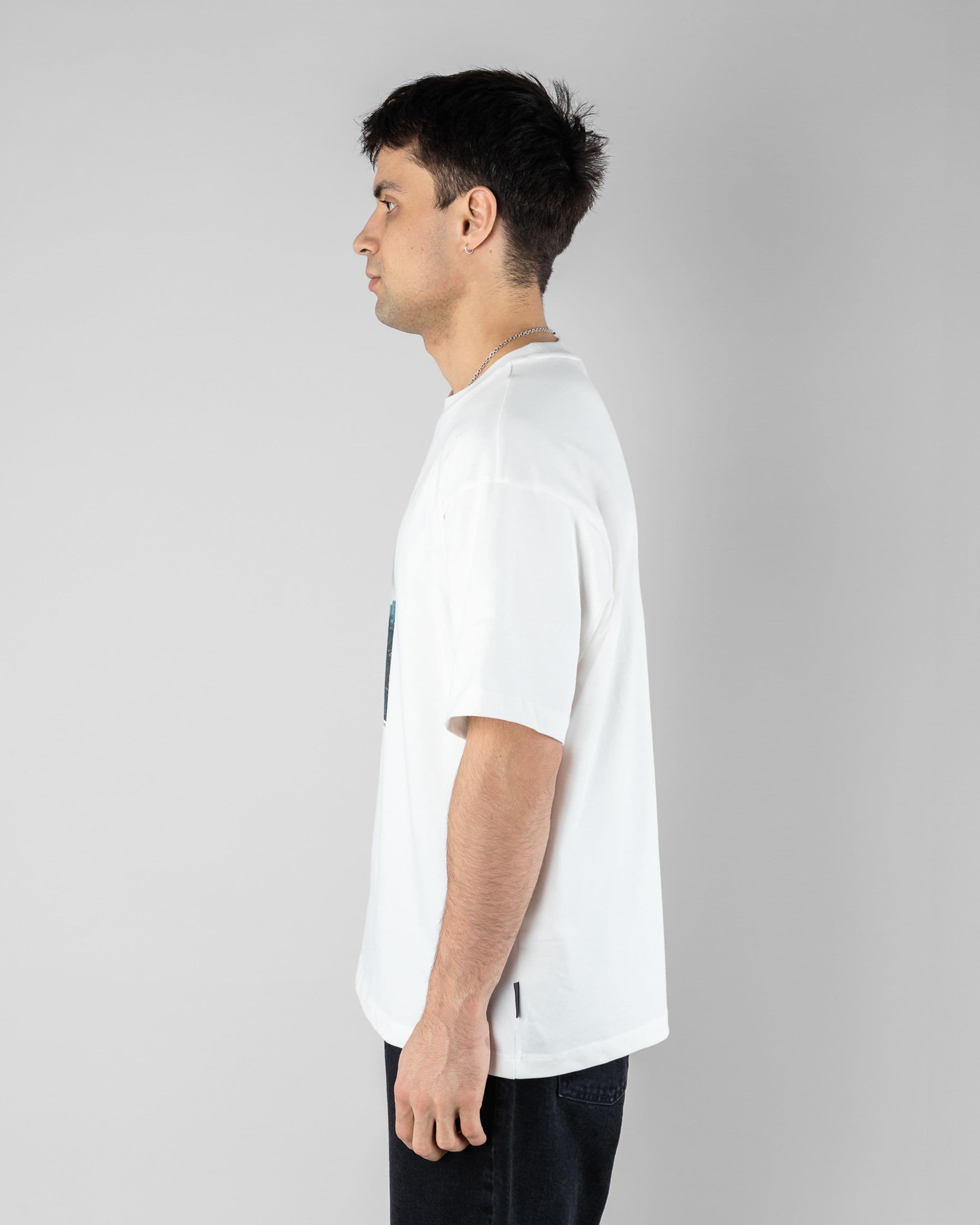 Tokyo Tee Beyond Medals Snowboard & Streetwear Model image side with Magnus as model